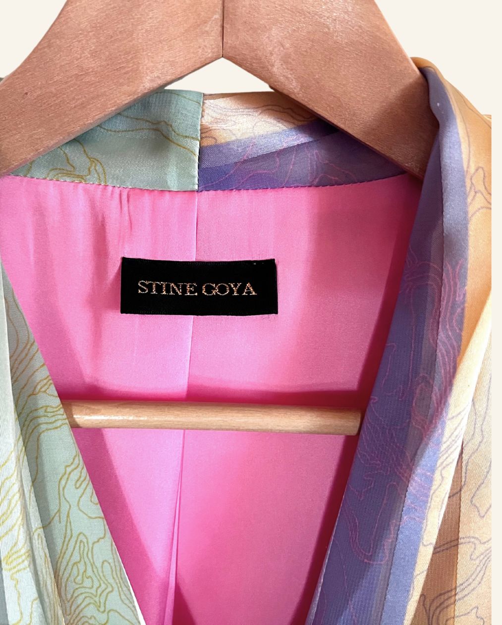STINE GOYA iconic "Glenda" satin wrap blouse