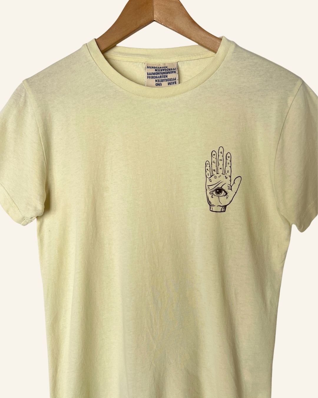 BAUM UND PFERDGARTEN Light yellow hand eye print t-shirt in organic cotton