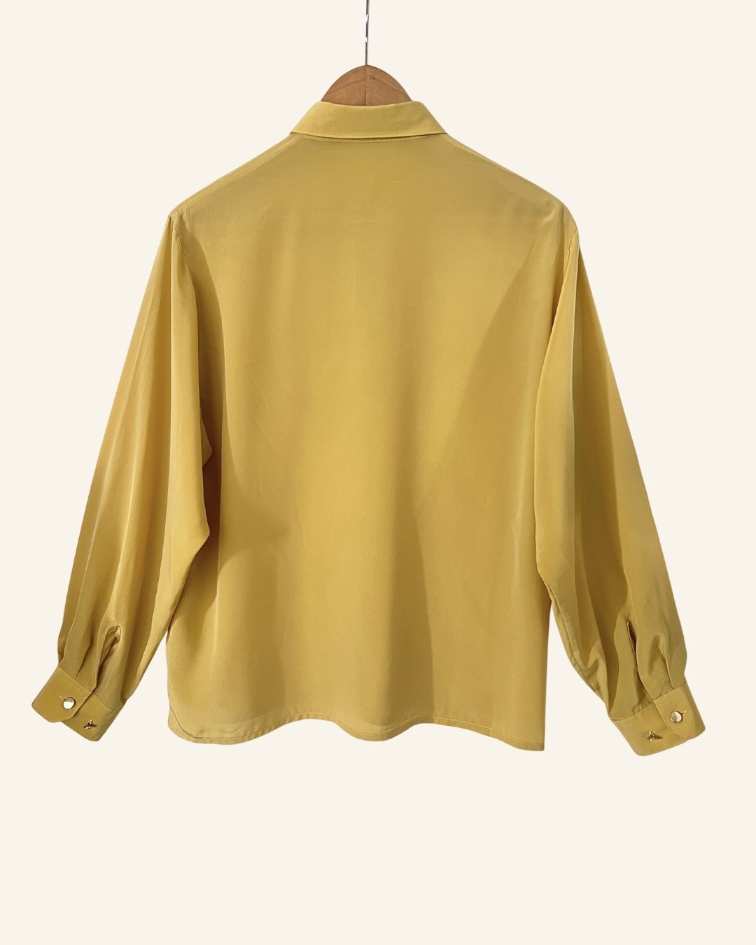 Vintage light yellow silky shirt with gold buttons