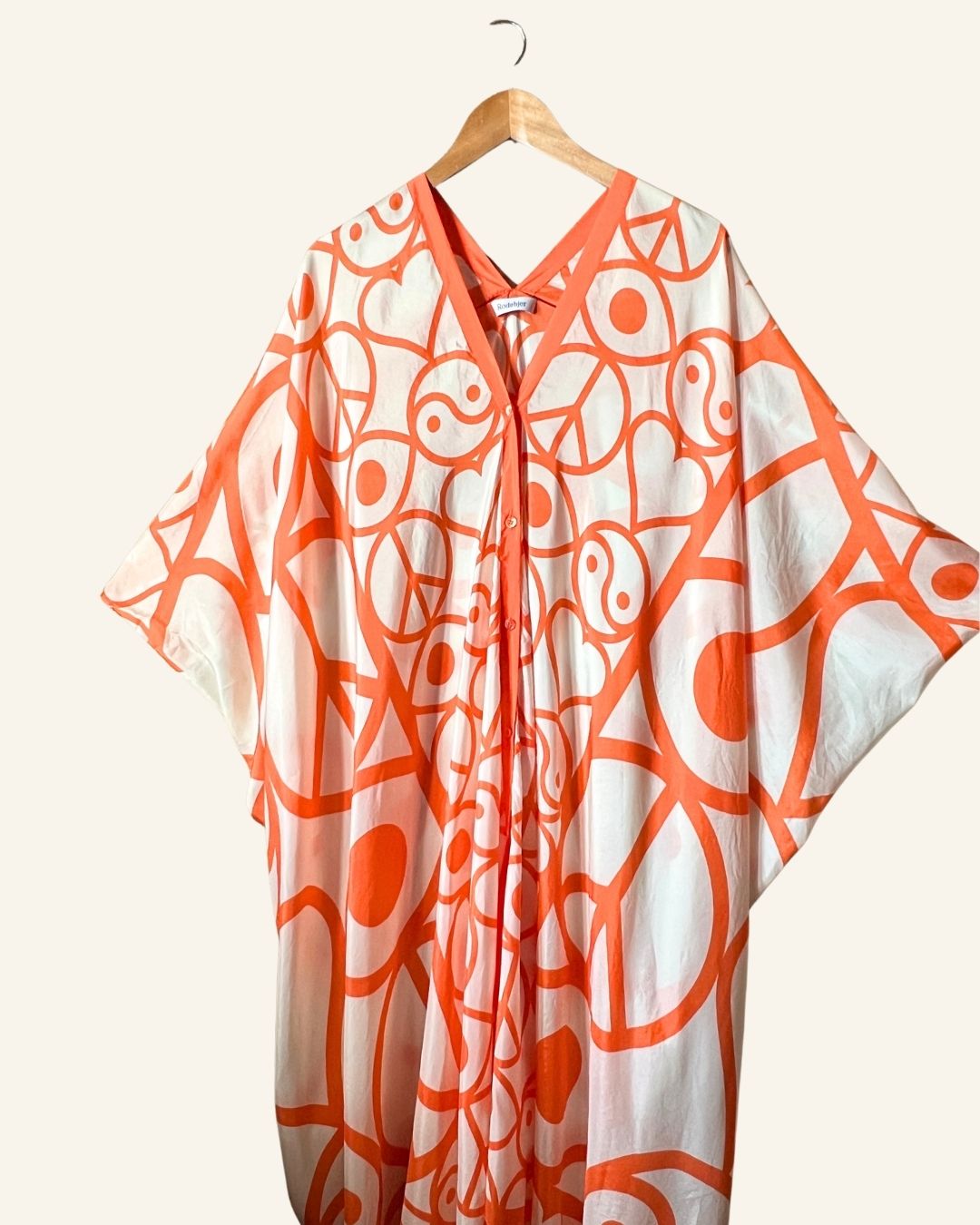 RODEBJER iconic silk Agave Symbols caftan dress in off white and orange