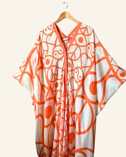 RODEBJER iconic silk Agave Symbols caftan dress in off white and orange
