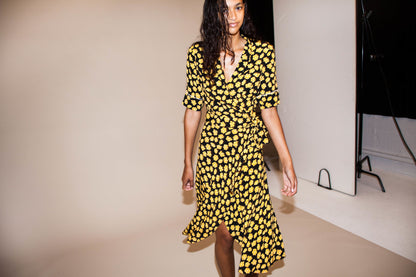 GANNI emory crepe black wrap dress with yellow floral print